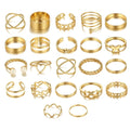 Collection of gold rings on a white background