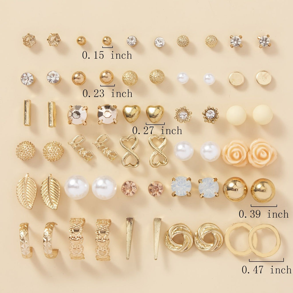 Collection of gold earrings with measurements on a beige background